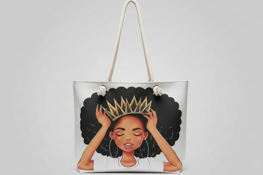 Tote bag with a design of a woman with an afro and crown on a gray background